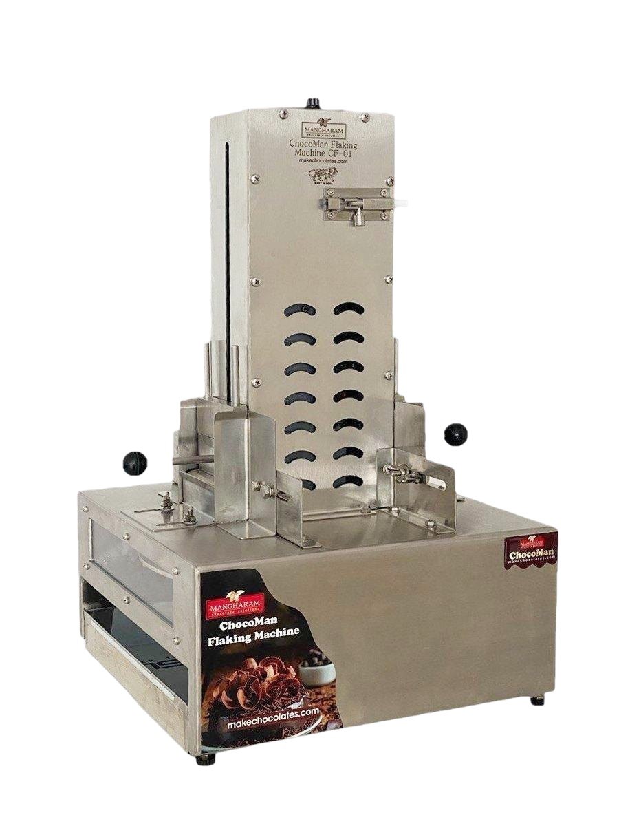 Food Grade 304 Stainless steel chocolate flaking machine on a white background is manufactured by Mangharam.